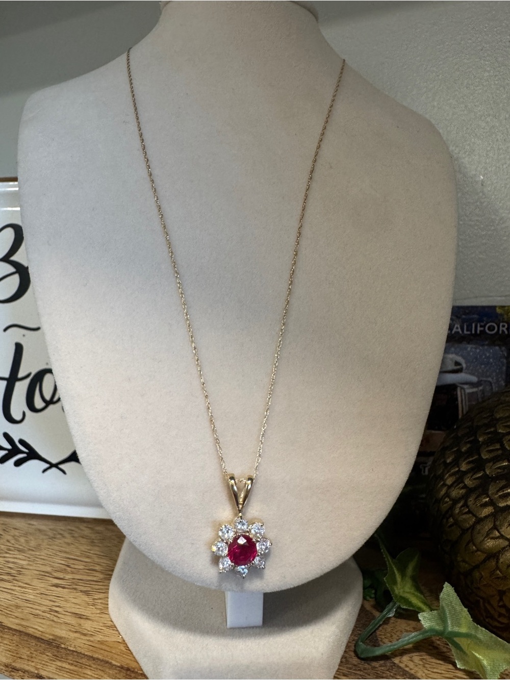 10 k ruby flower  Necklace with Red Center Stone and Clear Halo Pendant